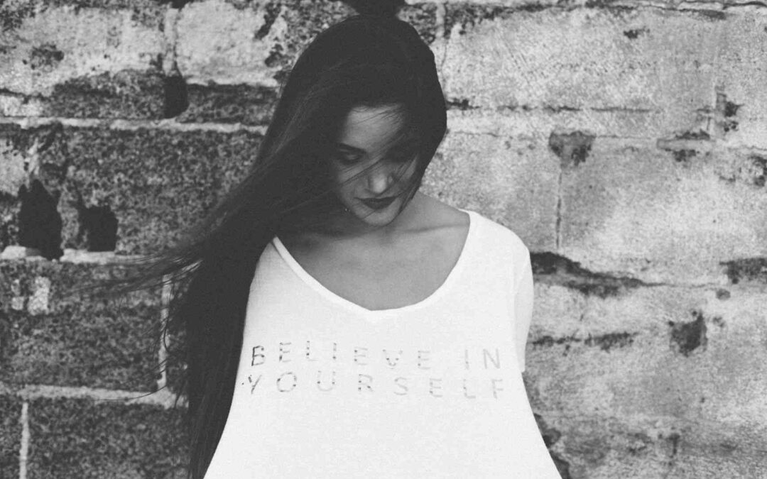 woman with a believe in yourself t-shirt